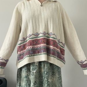 Cute little pullover with embroidery on the bottom